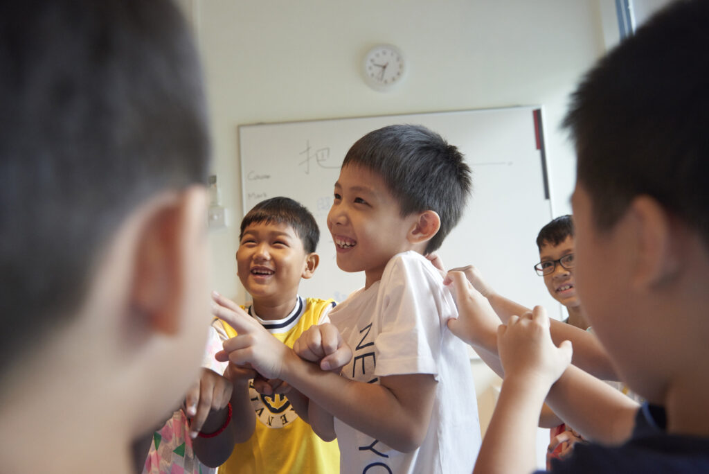 EduGrove's students participating in role-playing drama in Primary Chinese enrichment class